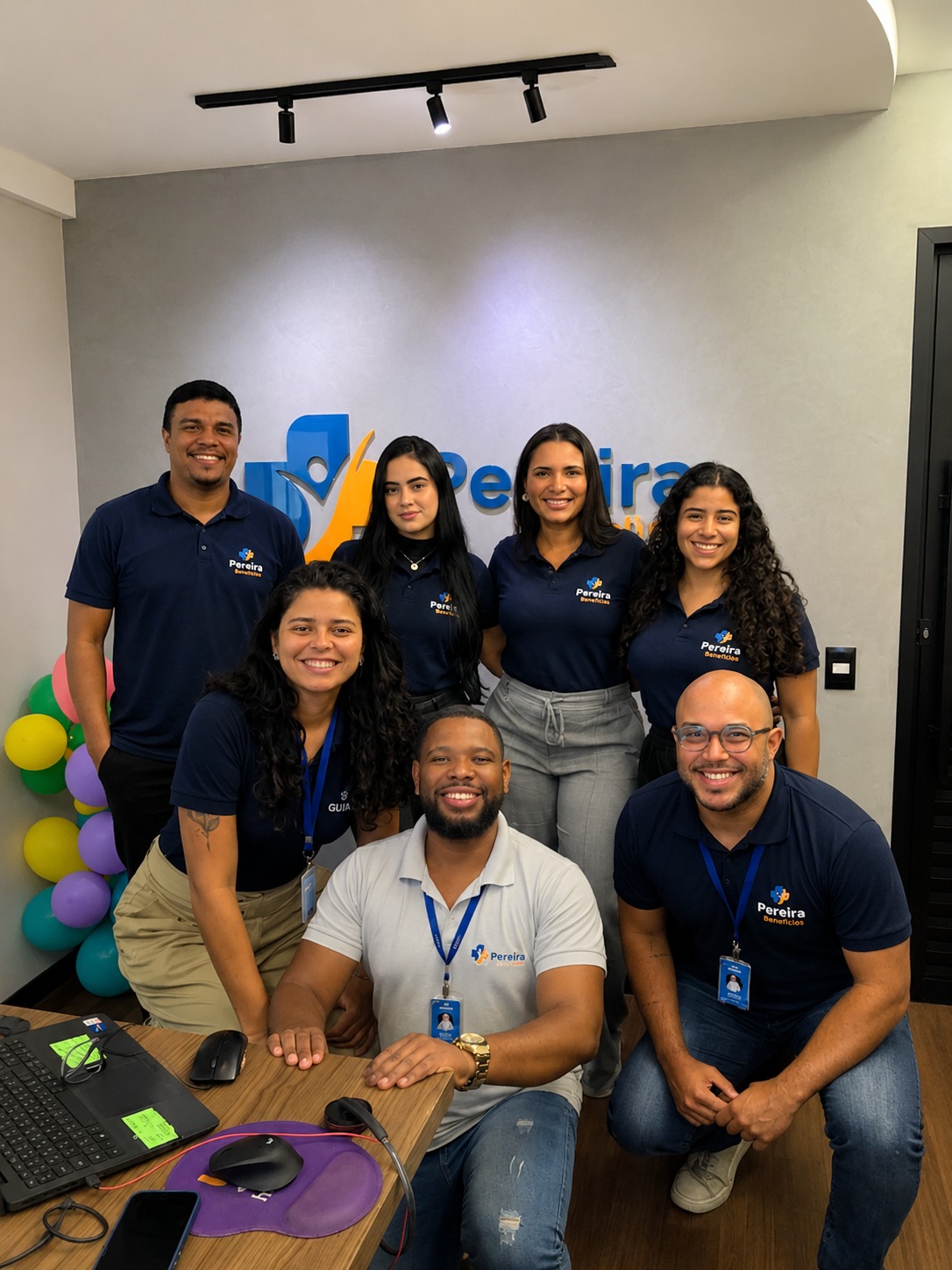 Equipe Pereira Benefícios — colaboradores em foto de grupo
